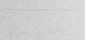 Concrete 20 , tynk drobnoziarnisty o wyglądzie betonu, filcowany i szlifowany. Charakteryzuje się lekko wygładzoną, jednak ciągle przywodzącą na myśl surowy beton, powierzchnią. Fot. STO