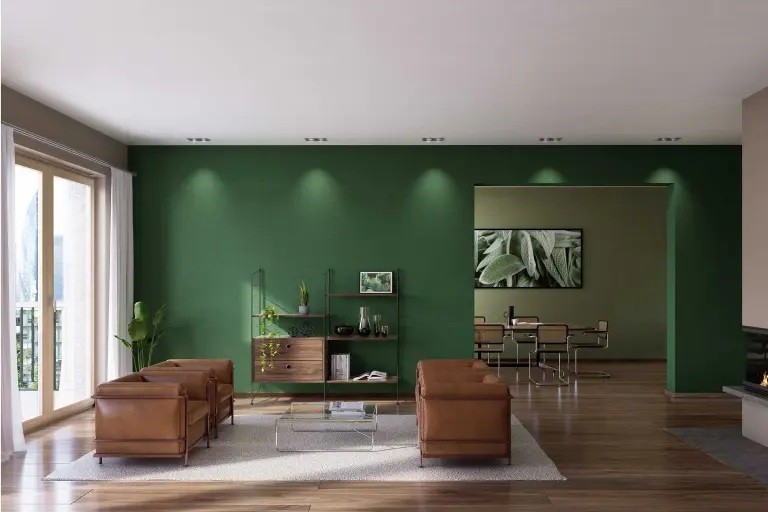 W tym salonie ściany zostały wykończone w naturalnych odcieniach Pine Green, Walnut Greyish, Cotton Nature i Salvia Green. Te barwy razem budują spokojną i harmonijną atmosferę, idealną do wypoczynku. Fot. STO